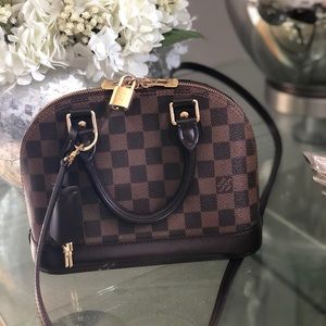 Authentic Guarantee LV Alma bb